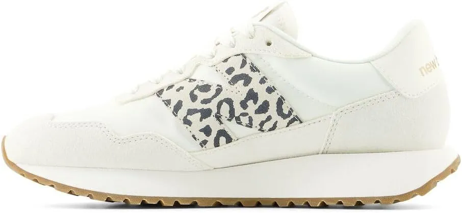 New Balance Women's 237 V1 Sneaker, Sea Salt/Black/Gold Metallic, 9